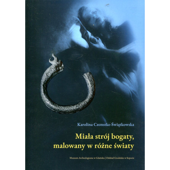 Miała strój bogaty, malowany w różne światy