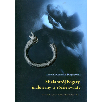Miała strój bogaty, malowany w różne światy